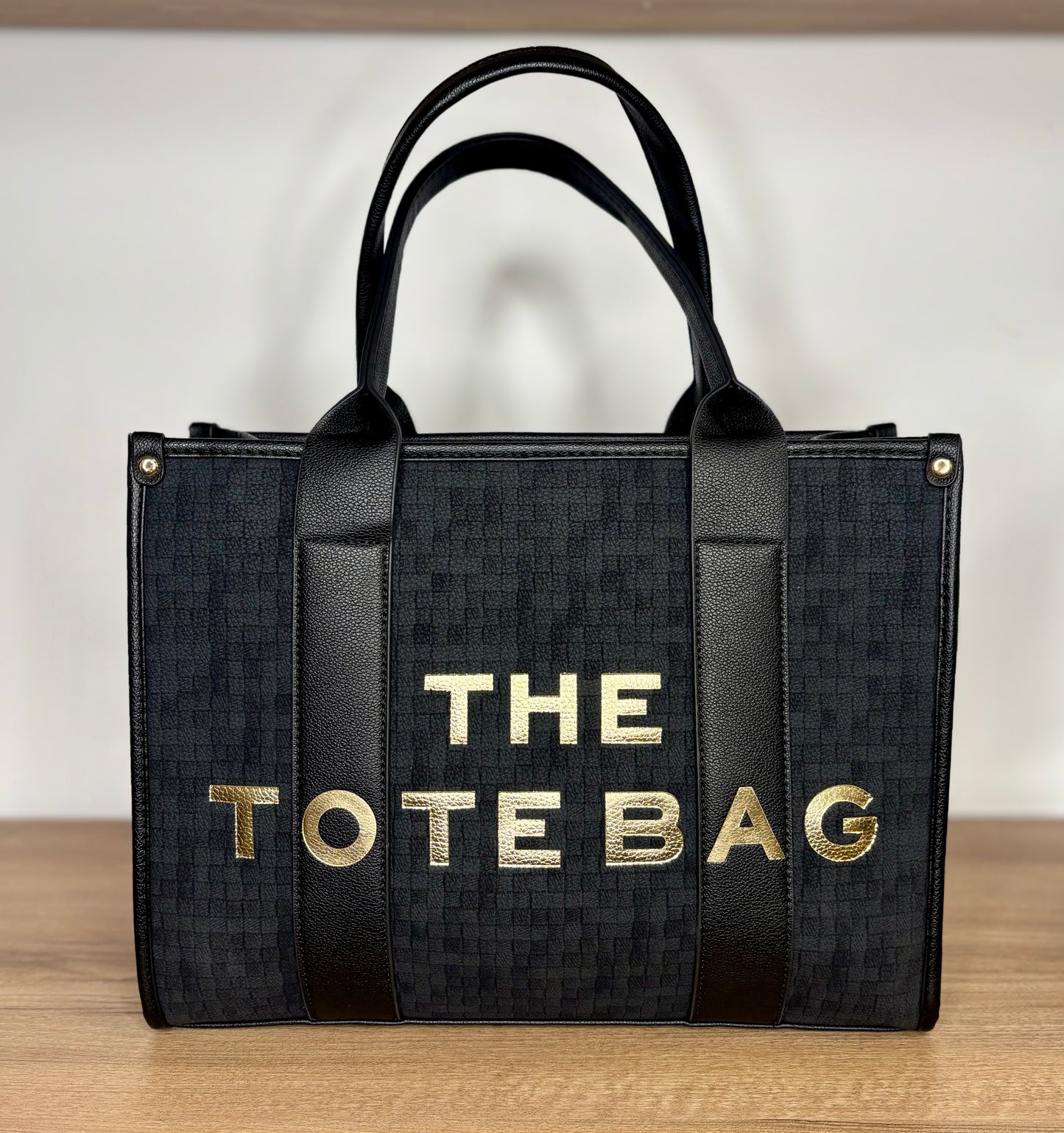 Large black and gold tote bag